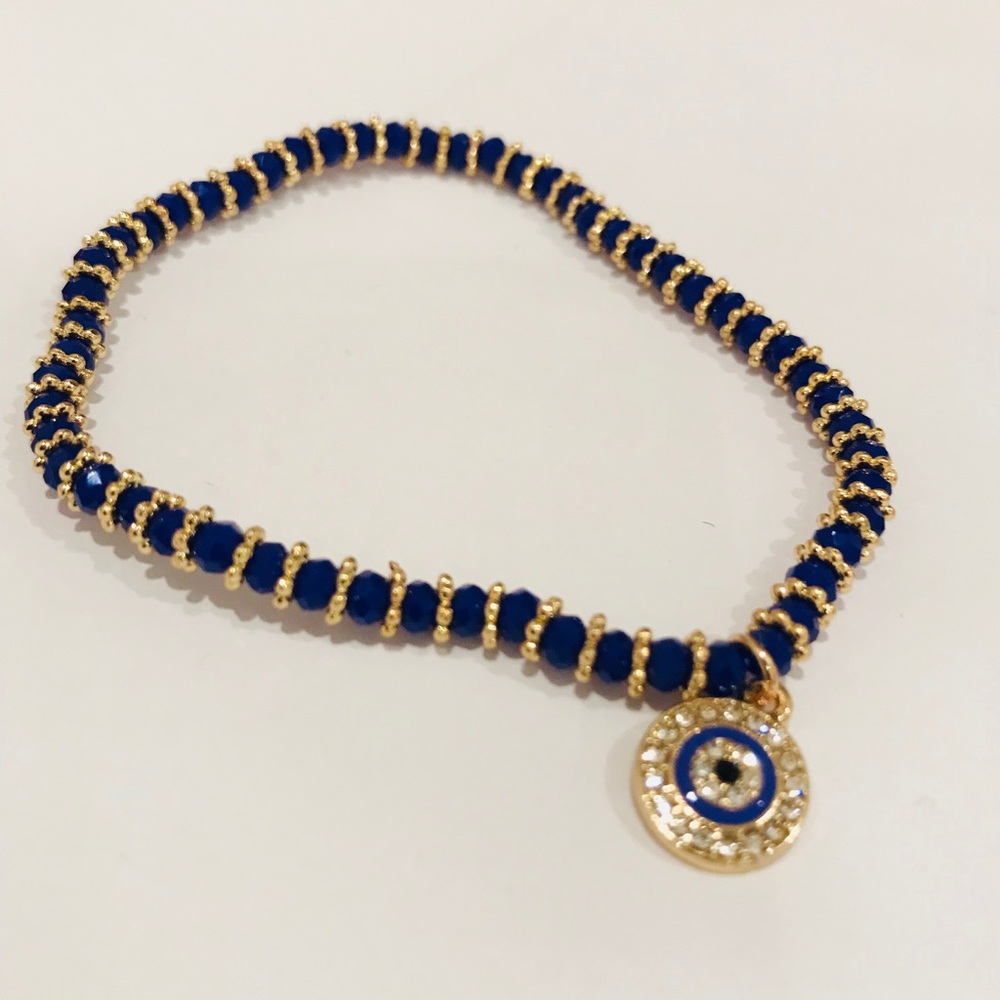 New With Tags Greek Eye bracelet gold & navy blue